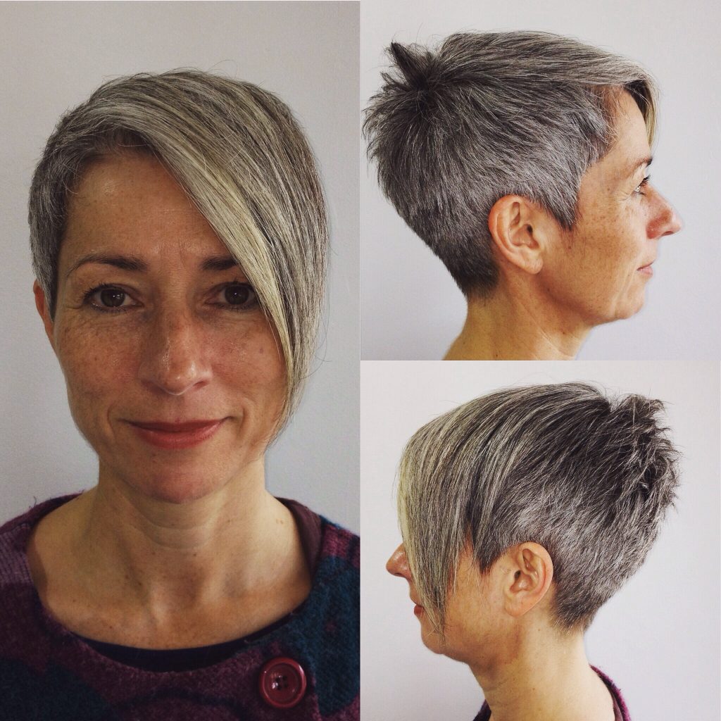 woman smiling with short hair and long fringe