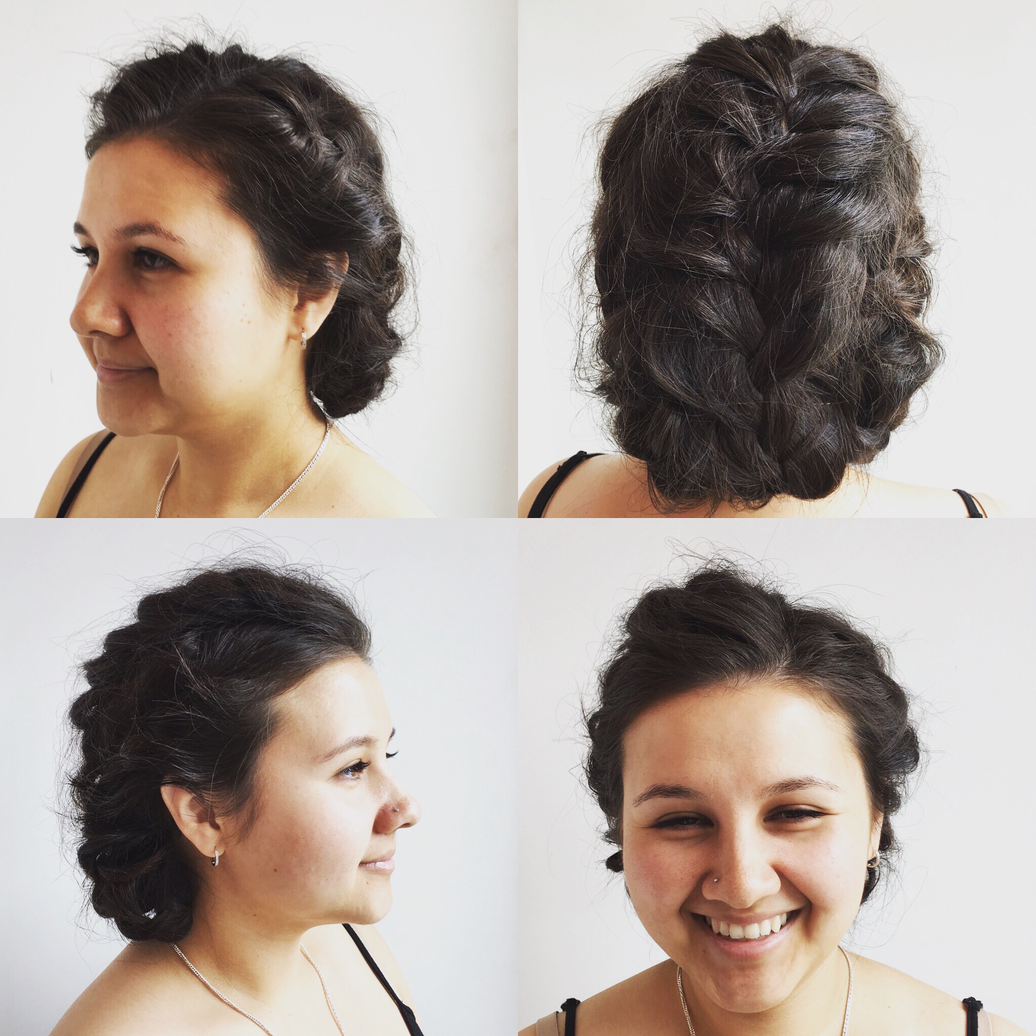 woman smiling with a braided hairstyle
