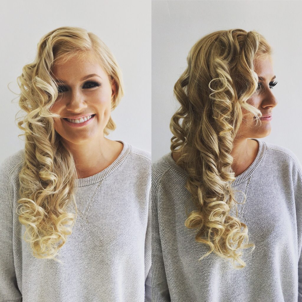 woman smiling with blonde curly hair