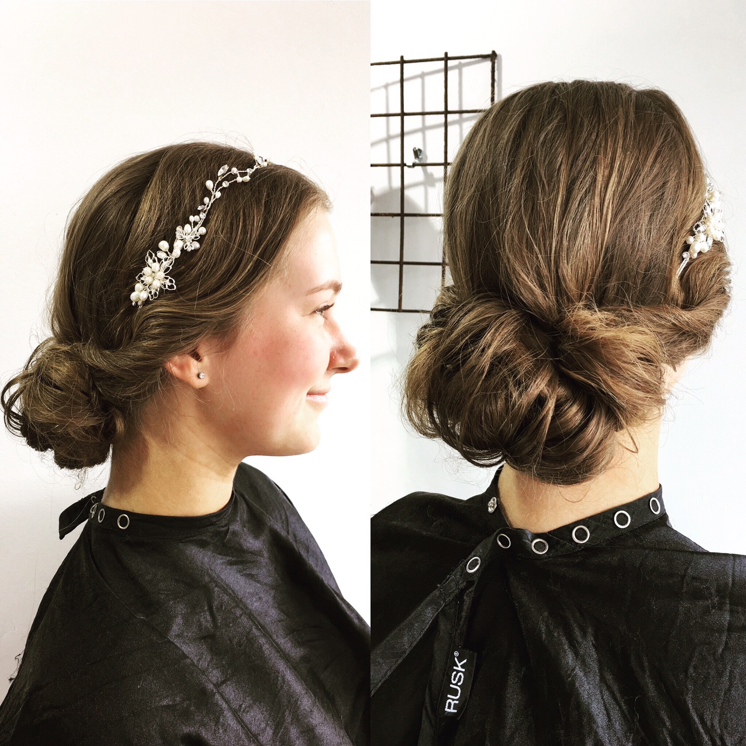 woman smiling with bun hairstyle