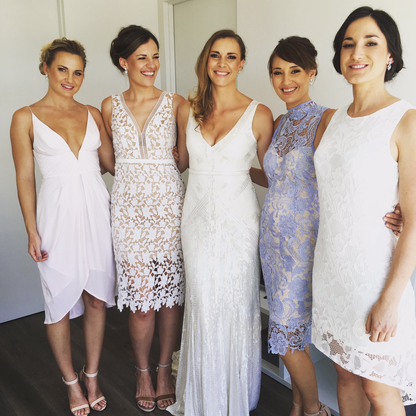 group of four women smiling