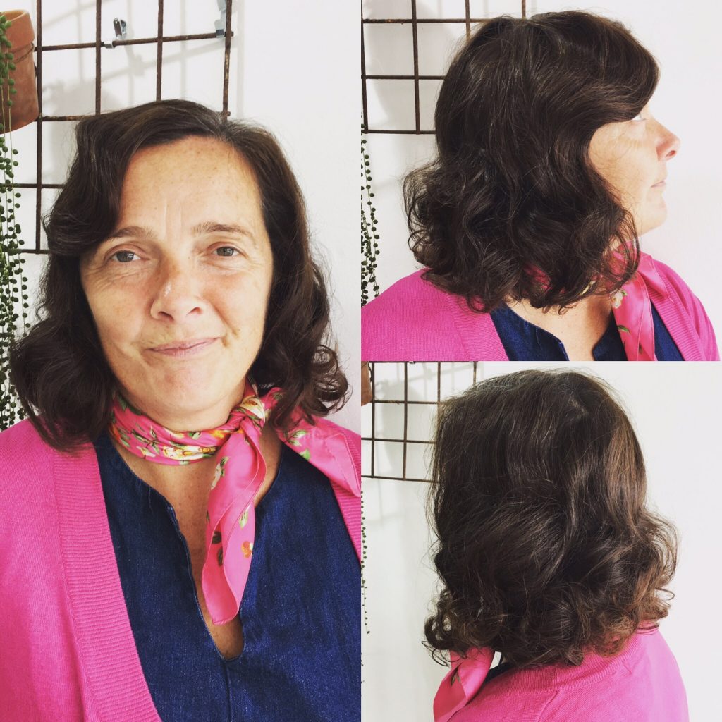 woman with short curled hair