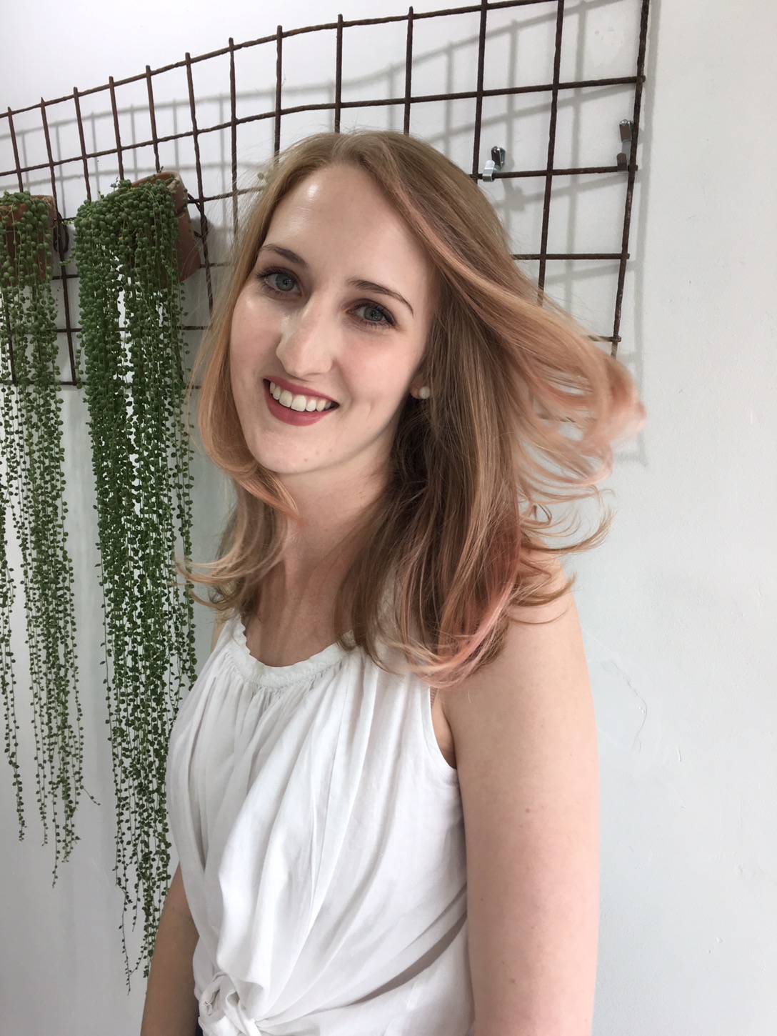 woman smiling with styled hair