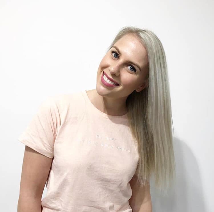 woman smiling with long blonde hair