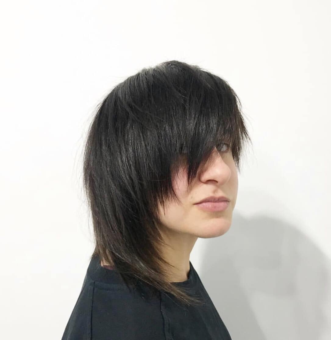 woman with short hair and long fringe 