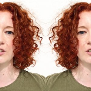 woman with short curly hair