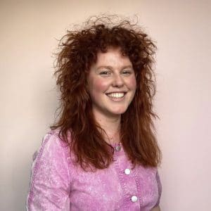 woman with red curly hair