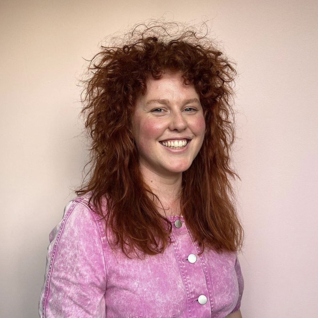 woman with red curly hair