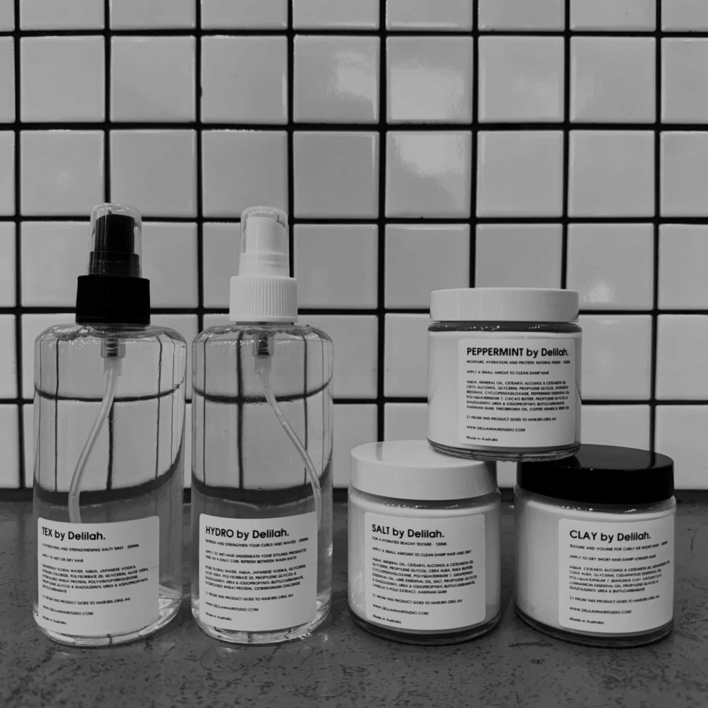 Delilah haircare products displayed stylishly—elevate your routine with premium, Australian-made treatments. Shop the full range today.