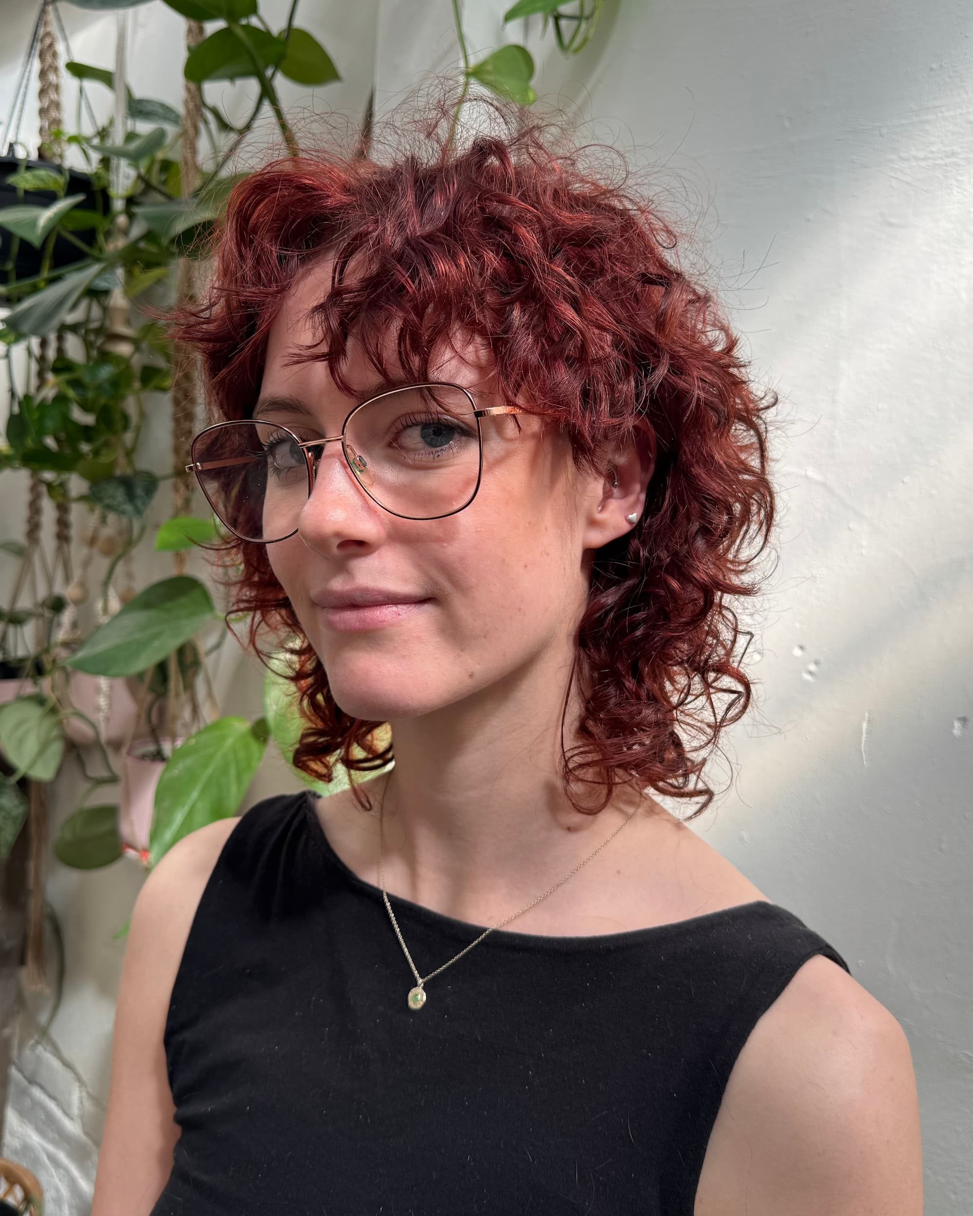 Edgy shag haircut on client