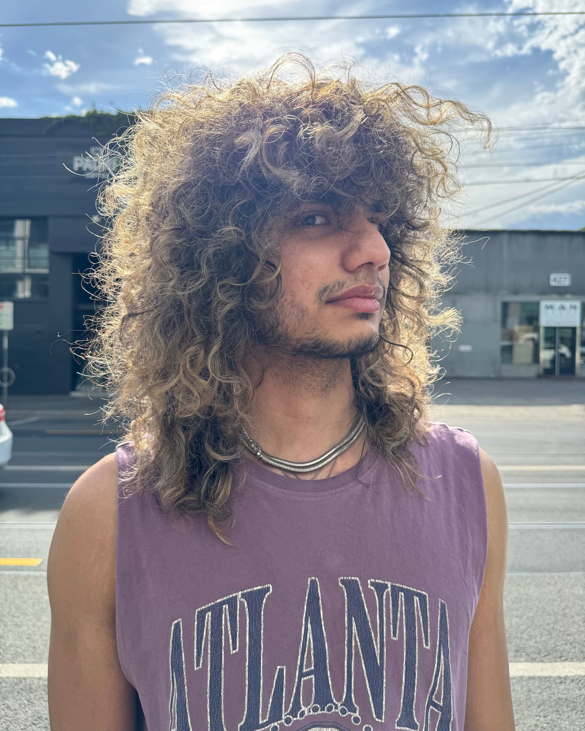 Modern shag haircut on male client