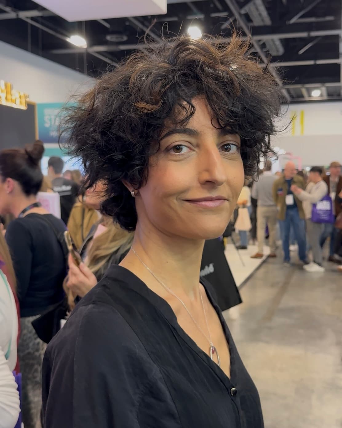 Short curly hairstyle by Delilah Hair Studio