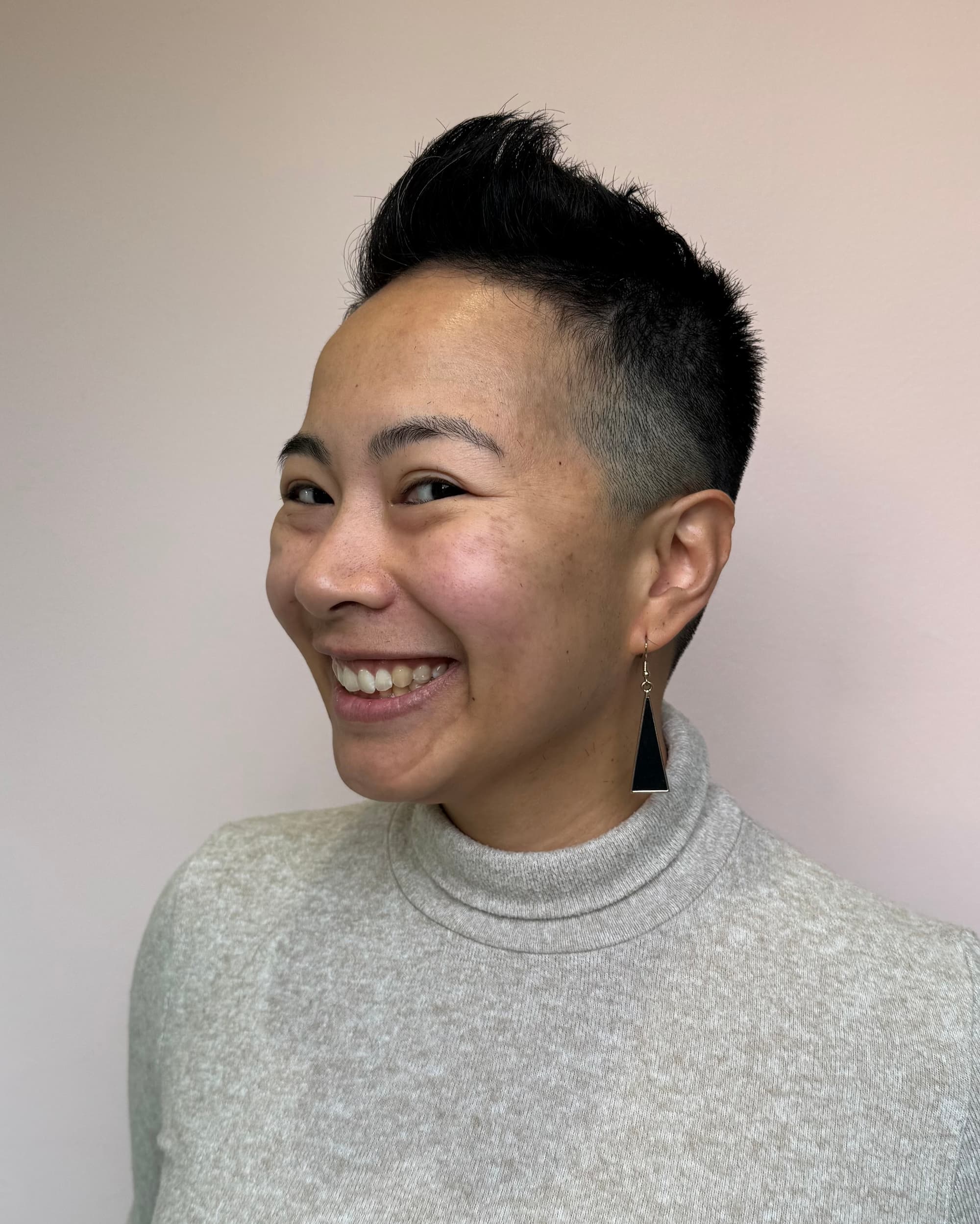 Short fade haircut by Delilah Hair Studio