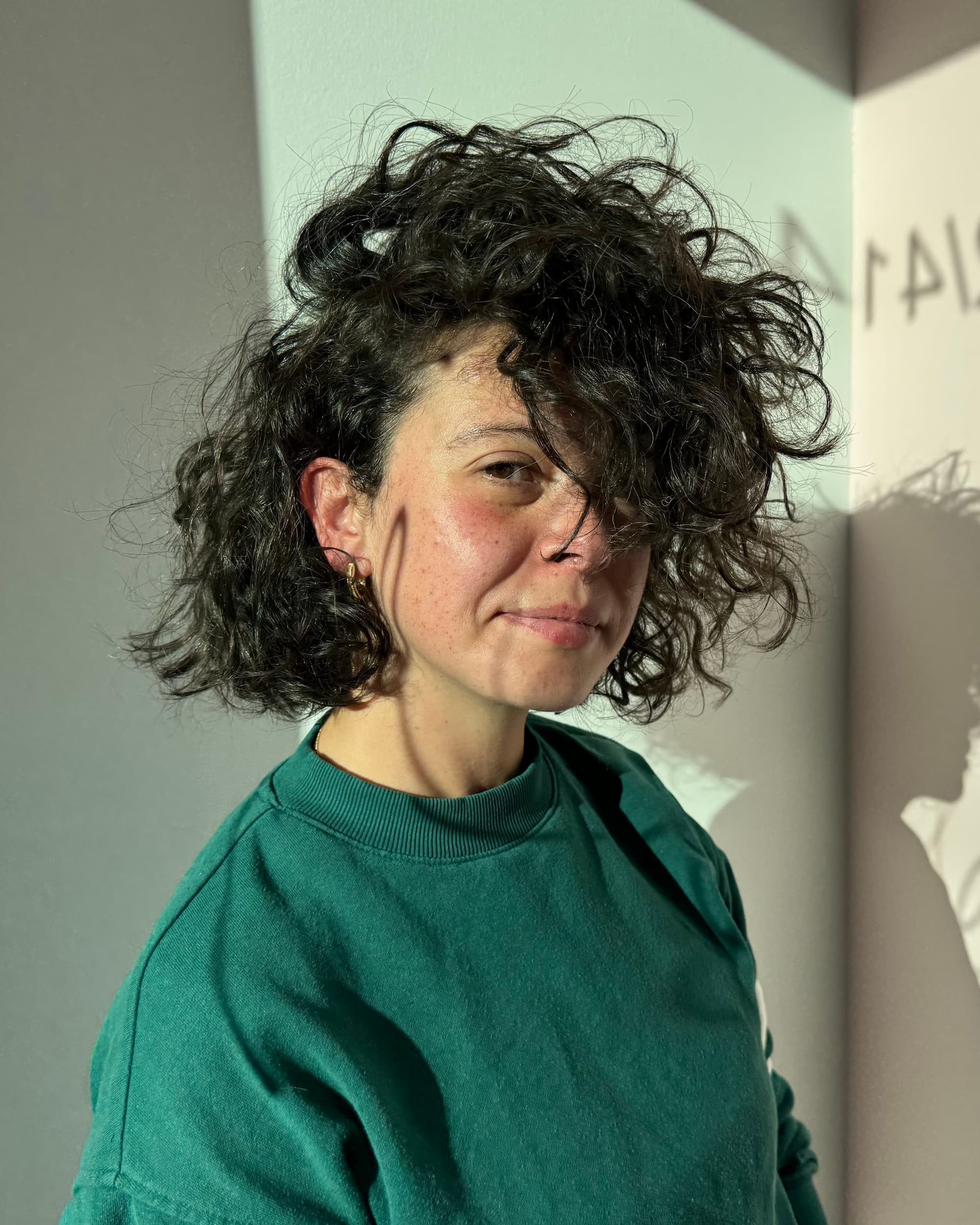 Voluminous curly shullet by Delilah Hair Studio